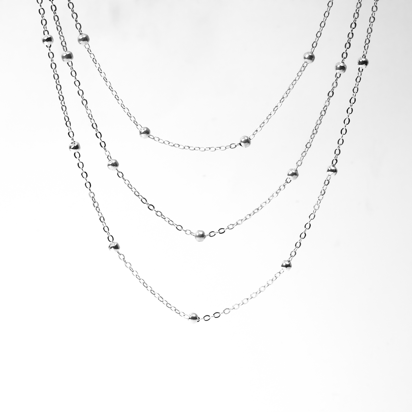 MULTI LAYERED CHAIN WITH STUDS NECKLACE